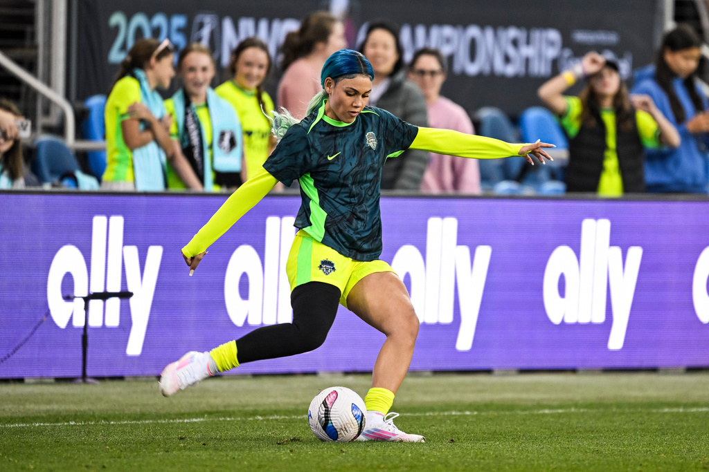 FILE - Washington Spirit forward Trinity Rodman (2) warms up before the NWSL women's championship soccer match against Gotham FC, Nov. 22, 2025, in San Jose, Calif. (AP Photo/Justine Willard, File)