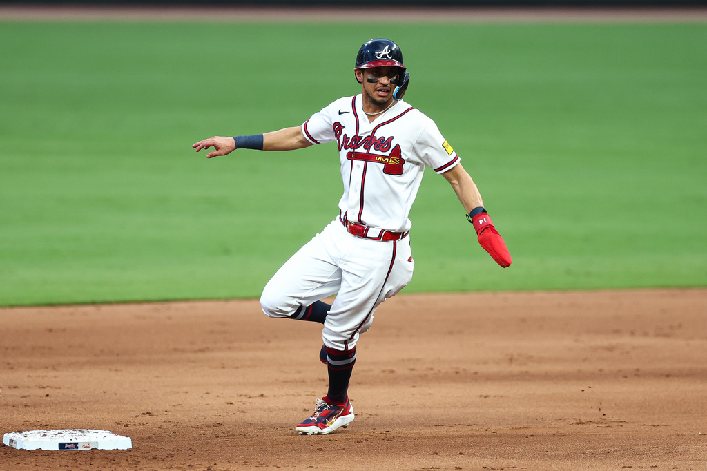 Atlanta Braves' Mauricio Dubón rounds second base in the first inning of a baseball game against the St. Louis Cardinals, Thursday, July 2, 2026, in Atlanta. (AP Photo/Colin Hubbard)