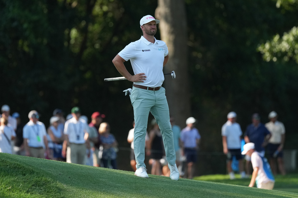 Wyndham Clark walks on the 14th fairway during the second round of the BMW Championship golf tournament, Friday, Aug. 21, 2026, in St. Louis. (AP Photo/Jeff Roberson)