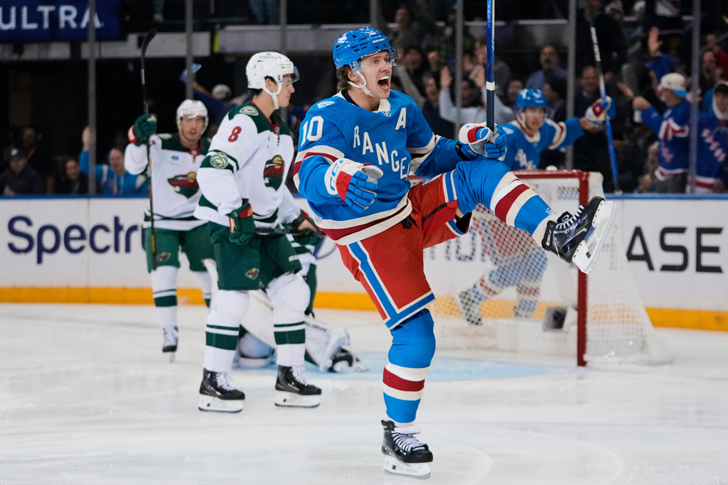 New York Rangers' Artemi Panarin (10) celebrates after scoring a goal during the first period of an NHL hockey game against the Minnesota Wild Monday, Oct. 20, 2025, at Madison Square Garden in New York. (AP Photo/Frank Franklin II)