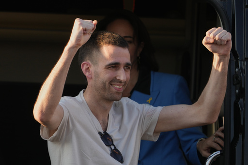 Freed Israeli hostage Avinatan Or gestures from a van as he arrives at Beilinson hospital in Petah Tikva, Israel, after he was released from Hamas captivity in the Gaza Stripl, Monday, Oct. 13, 2025. (AP Photo/Ariel Schalit) Freed Israeli hostage Avinatan Or gestures from a van as he arrives at Beilinson hospital in Petah Tikva, Israel, after he was released from Hamas captivity in the Gaza Stripl, Monday, Oct. 13, 2025. (AP Photo/Ariel Schalit)