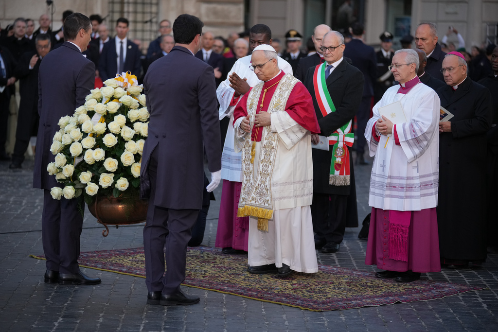 Pope Leo XIV arrives to pray in front of the statue of the Virgin Mary next to the Spanish Steps in Rome, Monday, Dec. 8, 2025, on the Catholic Feast of the Immaculate Conception. (AP Photo/Andrew Medichini)