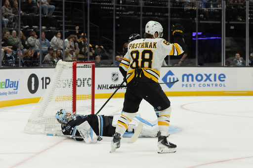 Boston Bruins right wing David Pastrnak (88) celebrates after a goal against Utah Mammoth goalie Vitek Vanecek, left, during the first period of an NHL hockey game Sunday, Oct. 19, 2025, in Salt Lake City. (AP Photo/Melissa Majchrzak) Boston Bruins right wing David Pastrnak (88) celebrates after a goal against Utah Mammoth goalie Vitek Vanecek, left, during the first period of an NHL hockey game Sunday, Oct. 19, 2025, in Salt Lake City. (AP Photo/Melissa Majchrzak)