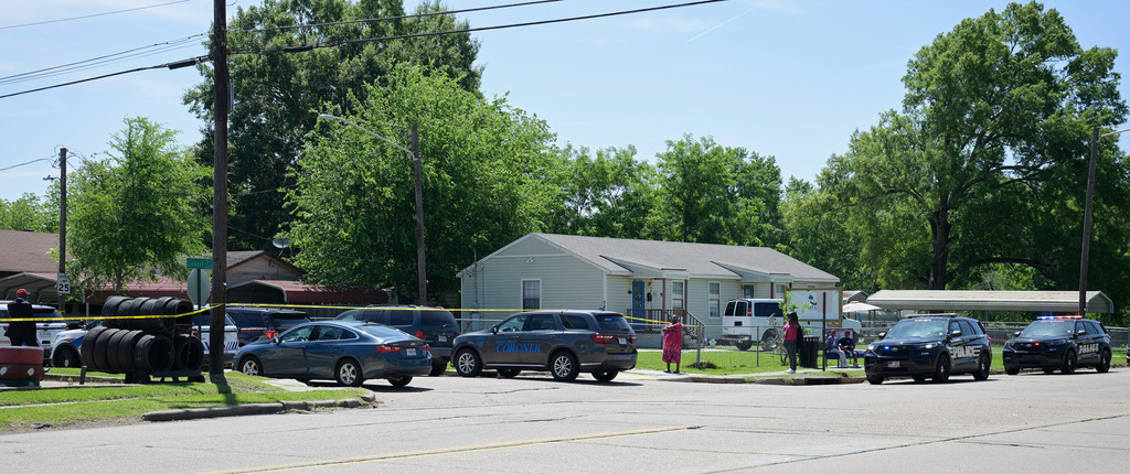 Police tape runs across 79th Street, in Shreveport, La., Sunday, April 19, 2026, as police work at the scene of a mass shooting. (Jill Pickett/The Times-Picayune/The New Orleans Advocate via AP)