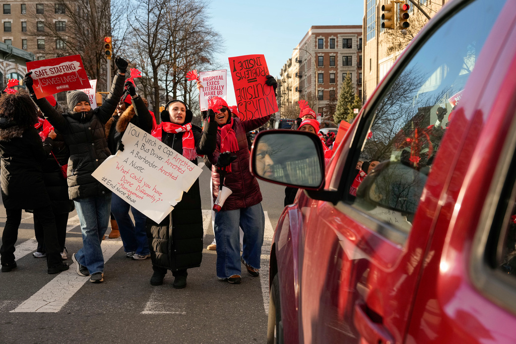 Nurses strike outside New York-Presbyterian Hospital, Monday, Jan. 12, 2026, in New York. (AP Photo/Yuki Iwamura)
