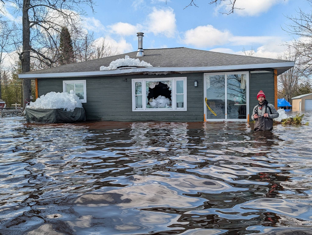 This image provided by Christopher Narsesian shows chunks of ice and flooding in Michigan’s Black Lake in the northeastern Lower Peninsula on April 19, 2026. (Christopher Narsesian via AP)