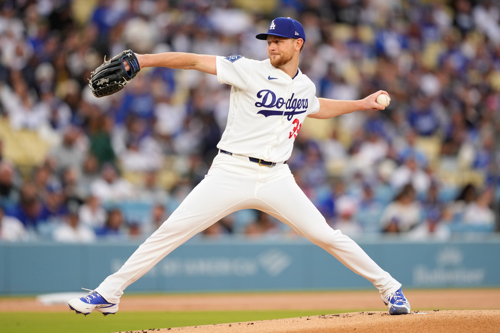 Los Angeles Dodgers pitcher Eric Lauer throws to the plate during the first inning of a baseball game against the Colorado Rockies, Tuesday, May 26, 2026, in Los Angeles. (AP Photo/Mark J. Terrill)