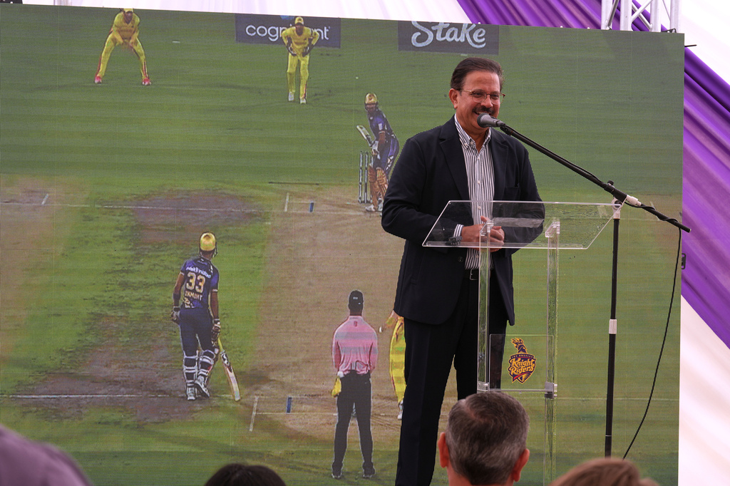 Venky Mysore, the chief executive officer (CEO) and managing director of the Kolkata Knight Riders (KKR) welcomes guests to the groundbreaking ceremony for the official home field for the Los Angeles Knight Riders for 2026, and the future venue of the LA 2028 Olympics Fairgrounds Cricket Stadium at the Pomona Fairplex in Pomona, Calif., Wednesday, April 22, 2026. (AP Photo/Damian Dovarganes)