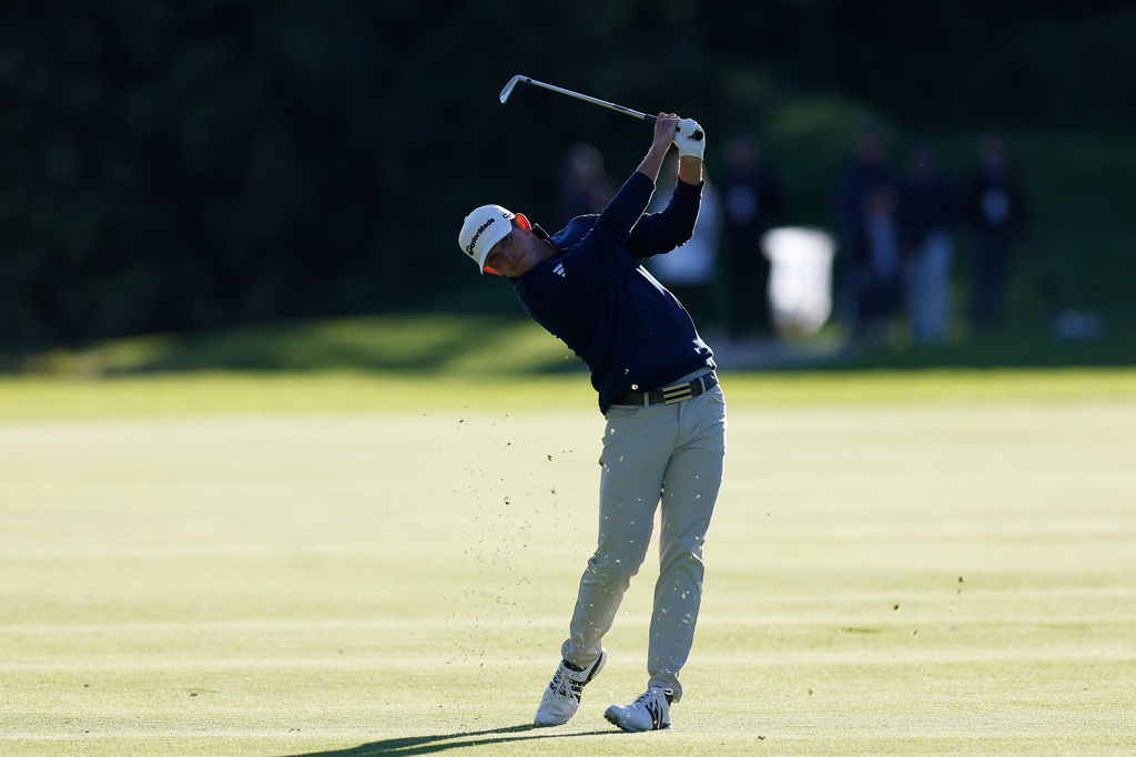 Jacob Bridgeman hits from the 18th fairway during the second round of the Genesis Invitational golf tournament at Riviera Country Club, Friday, Feb. 20, 2026, in the Pacific Palisades area of Los Angeles. (AP Photo/Caroline Brehman)