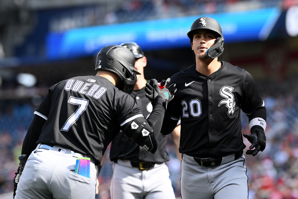 Chicago White Sox's Miguel Vargas (20) celebrates after his two-run home run with Edgar Quero (7) during the first inning of a baseball game against the Washington Nationals, Sunday, Sept. 28, 2025, in Washington. (AP Photo/Nick Wass)