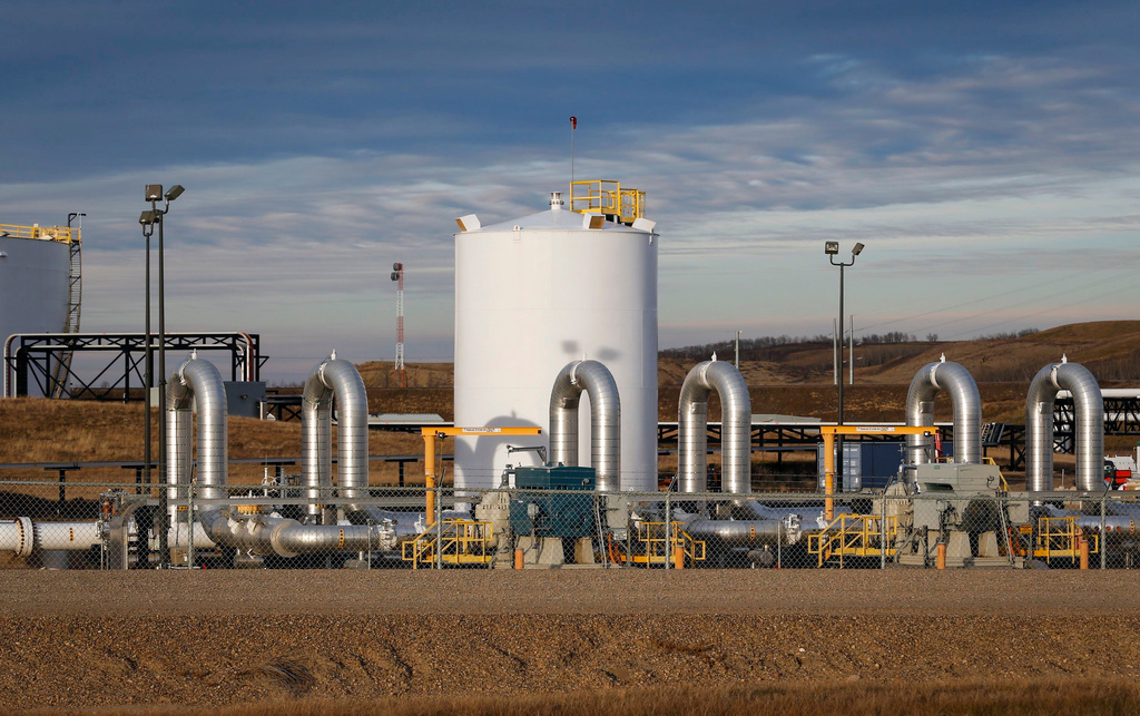 FILE - A Keystone pipeline facility stands in Hardisty, Alberta, Nov. 6, 2015. (Jeff McIntosh/The Canadian Press via AP, File)