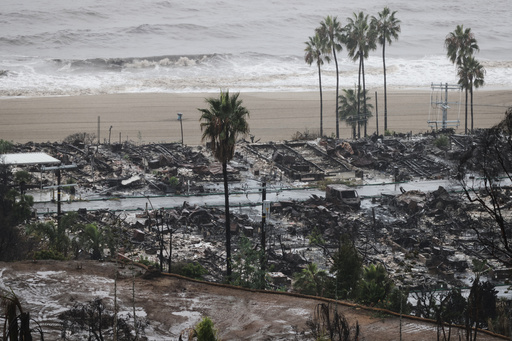 Rain comes down on a neighborhood in the Palisades Fire zone on Tuesday, Oct. 14, 2025, in the Pacific Palisades section of Los Angeles. (AP Photo/Ethan Swope) Rain comes down on a neighborhood in the Palisades Fire zone on Tuesday, Oct. 14, 2025, in the Pacific Palisades section of Los Angeles. (AP Photo/Ethan Swope)