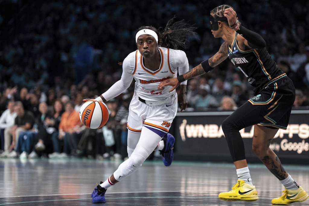 Phoenix Mercury guard Kahleah Copper (2), defended by New York Liberty guard Natasha Cloud (9), heads toward the basket during Game 2 in the first round of the WNBA basketball playoffs, Wednesday, Sept. 17, 2025, in New York. (AP Photo/Angelina Katsanis)
