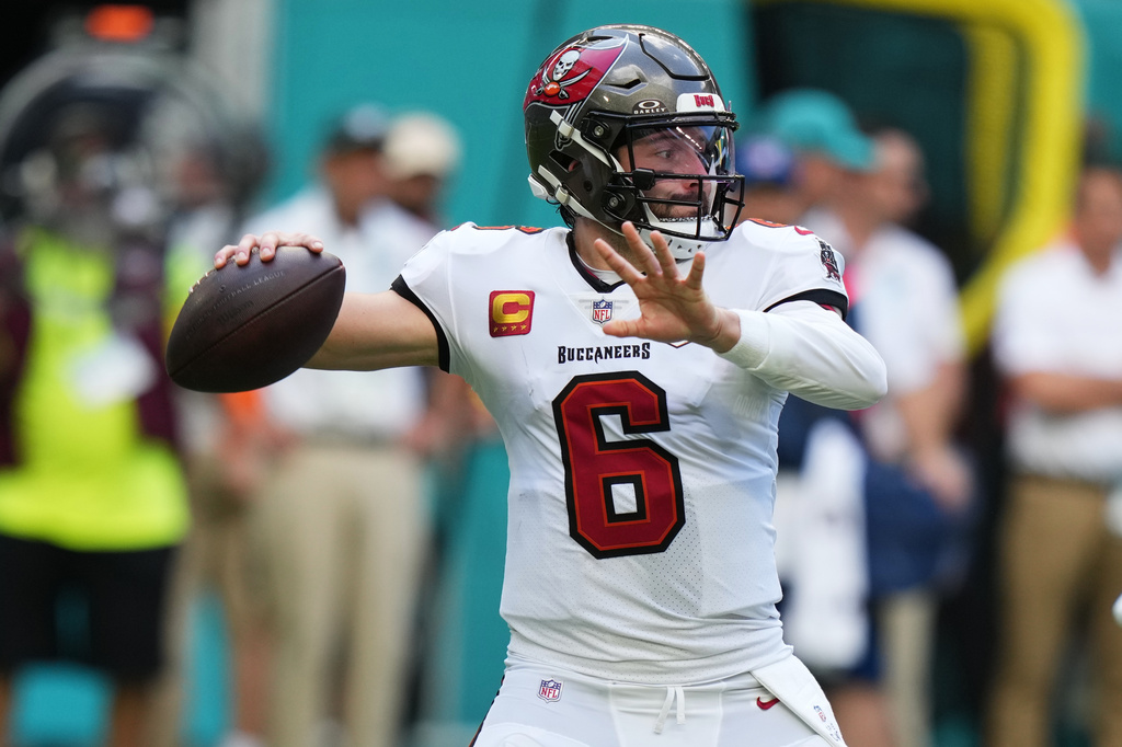 FILE - Tampa Bay Buccaneers quarterback Baker Mayfield (6) looks to pass during the first half of an NFL football game against the Miami Dolphins, Sunday, Dec. 28, 2025, in Miami Gardens, Fla. (AP Photo/Lynne Sladky, File)