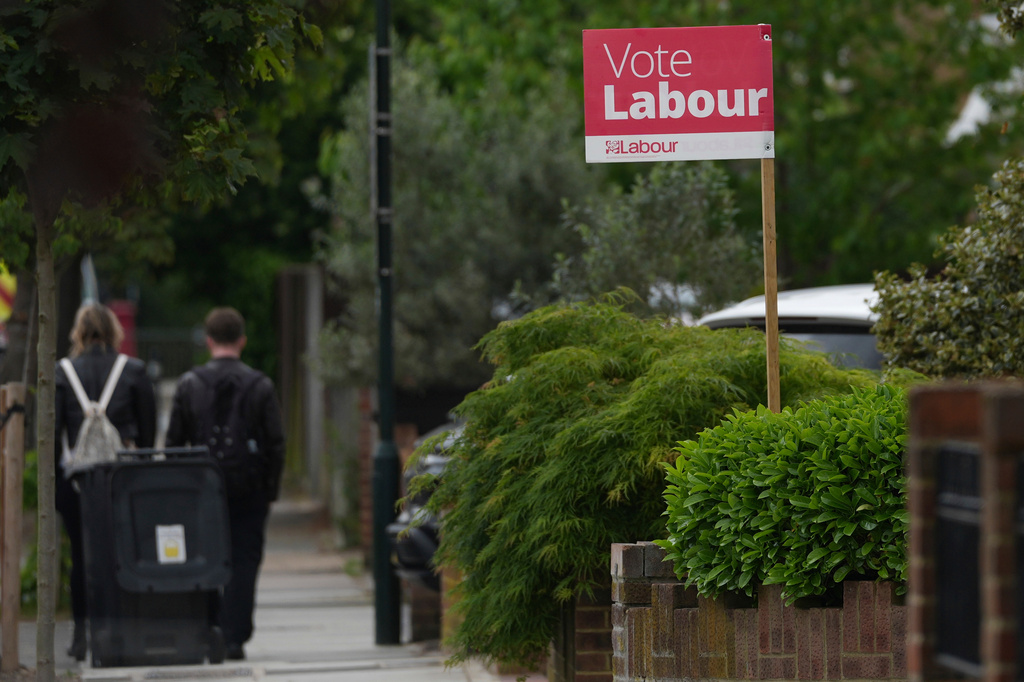 A Labour Party political sign put up by the householder to show support ahead of local council elections in London, Wednesday, May 6, 2026. (AP Photo/Alastair Grant)