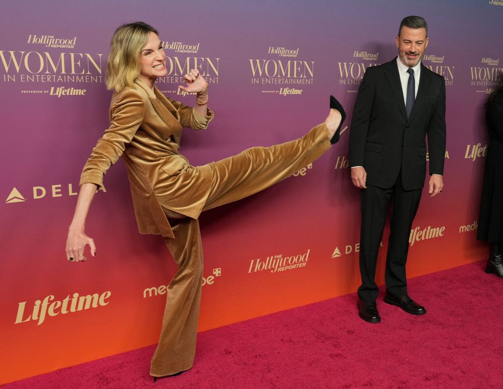 Molly McNearney, left, and Jimmy Kimmel arrive at The Hollywood Reporter's Women in Entertainment Gala on Wednesday, Dec. 3, 2024, at the Beverly Hills Hotel in Beverly Hills, Calif. (Photo by Jordan Strauss/Invision/AP)