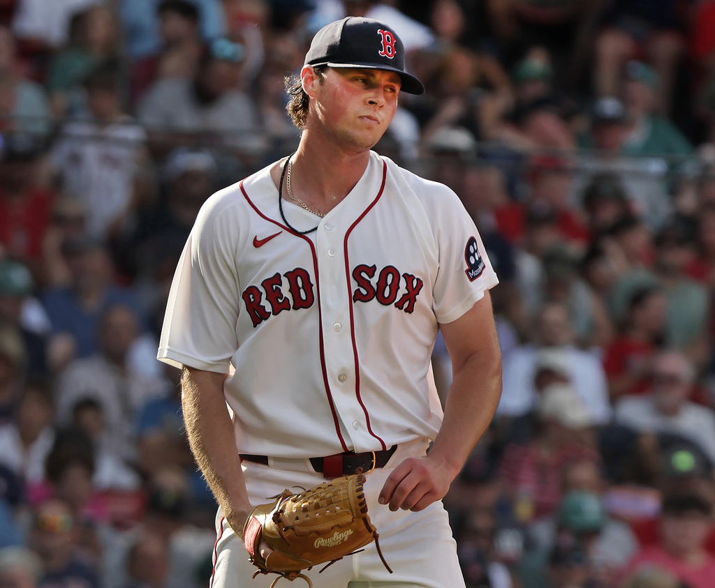 Boston Red Sox pitcher Jake Bennett reacts after giving up a run in the fifth inning of a baseball game against the Athletics, Saturday, Aug. 8, 2026 in Boston. (AP Photo/Jim Davis)