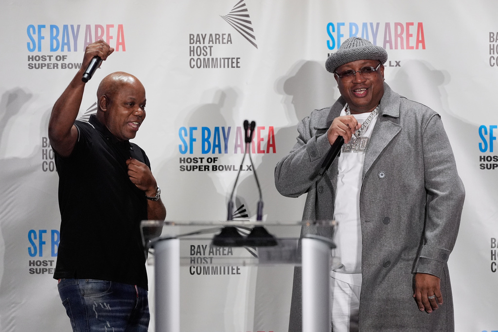 Rappers Too Short, left, and E-40 speak during a Bay Area Host Committee news conference for the NFL Super Bowl football game in San Francisco, Monday, Feb. 2, 2026. (AP Photo/Jeff Chiu)