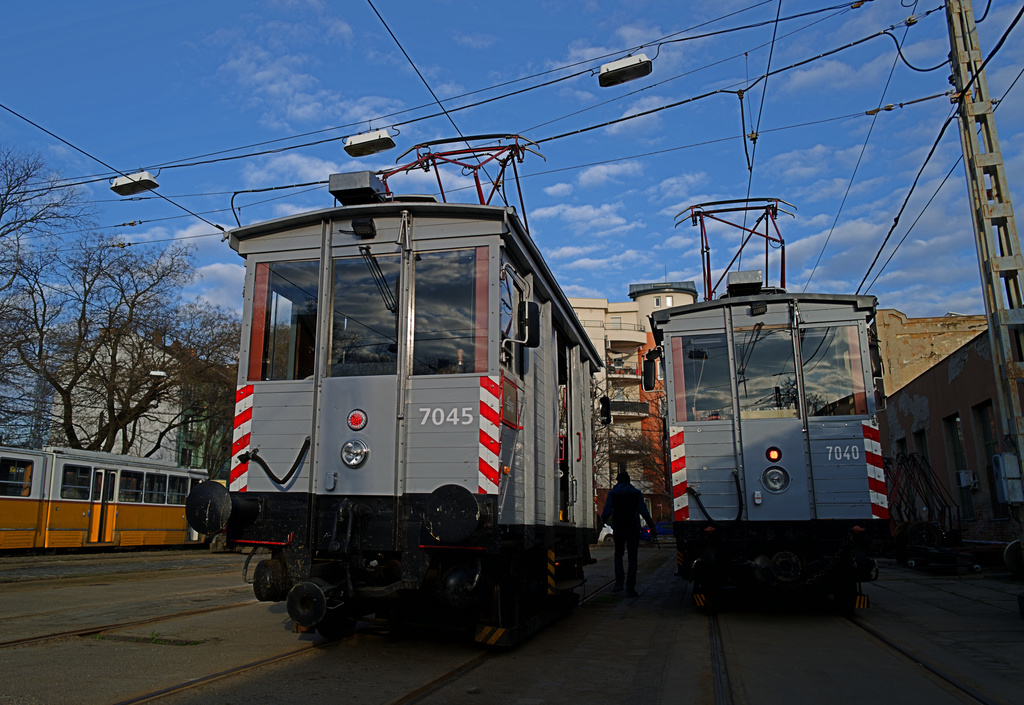 Two century-old freight trams are parked in the Kelenfold tram depot in Budapest, Hungary on Thursday, March 12, 2026. (AP Photo/Bela Szandelszky)