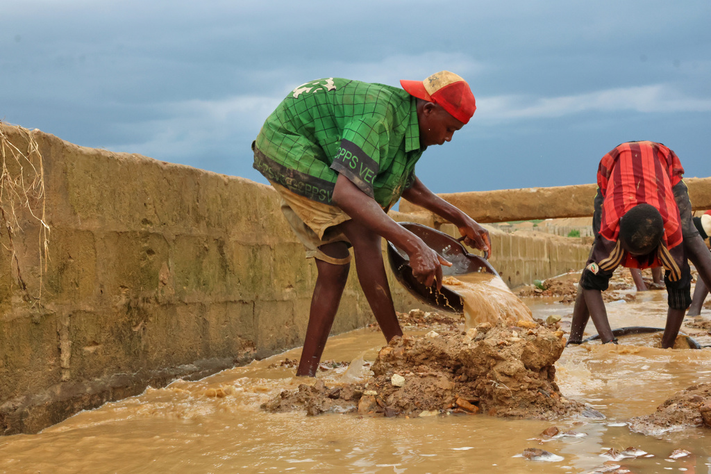People work at a mine in Minna, Nigeria, Saturday, Sept. 19, 2026. (AP Photo/Afolabi Sotunde)