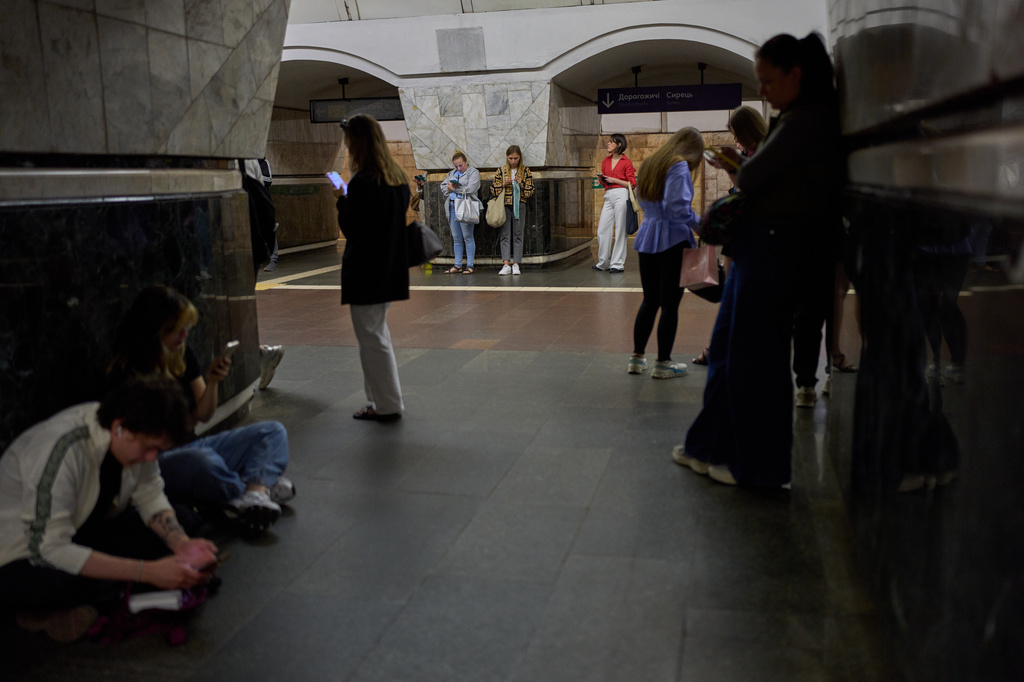 Commuters shelter at Palats Sportu metro station during an air raid alarm in Kyiv, Ukraine, Thursday, Aug. 27, 2026. (AP Photo/Francisco Seco)
