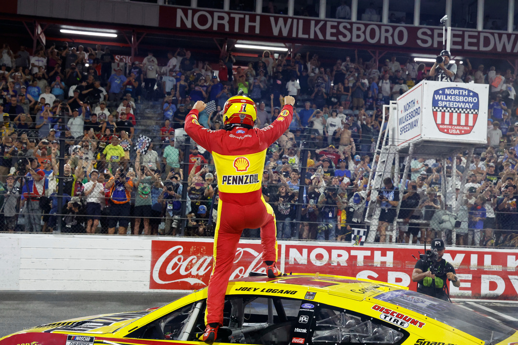 Joey Logano celebrates after winning a NASCAR Cup Series auto race in North Wilkesboro, N.C., Sunday, July 19, 2026. (AP Photo/Terry Renna)