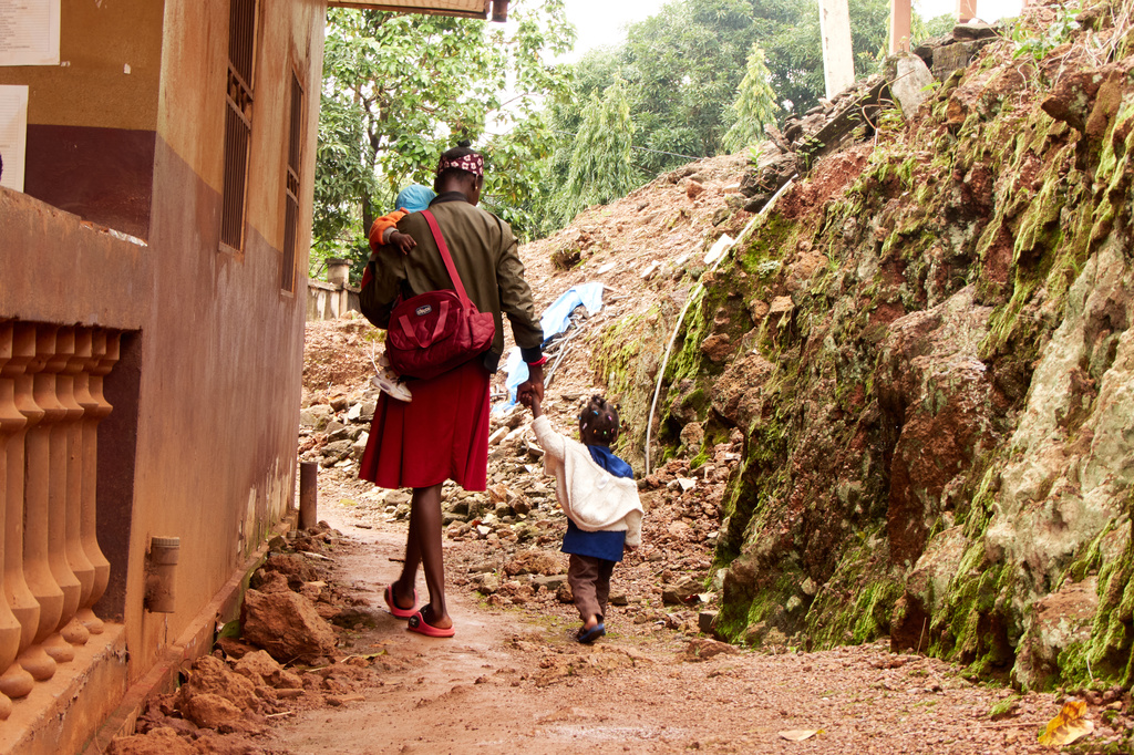 A woman leaves after attending a malaria vaccination rollout session at the Soa District Hospital in Yaounde, Cameroon, Wednesday, April 29, 2026. (AP Photo/Angel Ngwe)