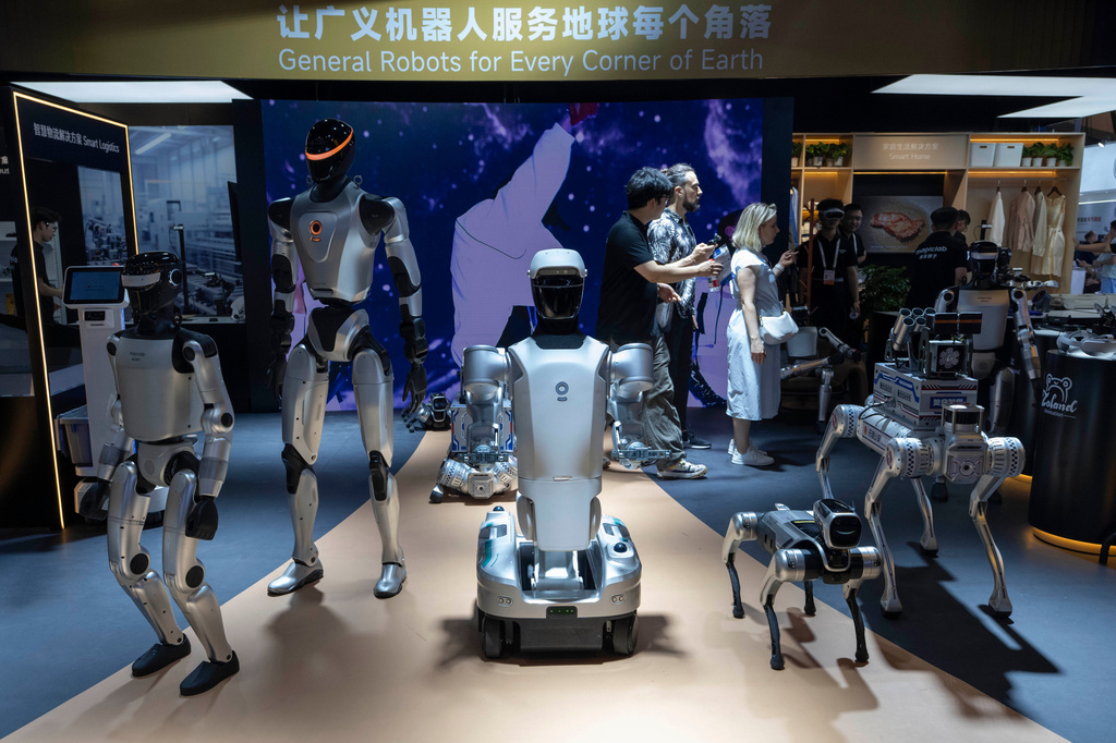 A variety of robots are displayed at the World AI Conference in Shanghai, Friday, July 17, 2026. (AP Photo/Ng Han Guan)