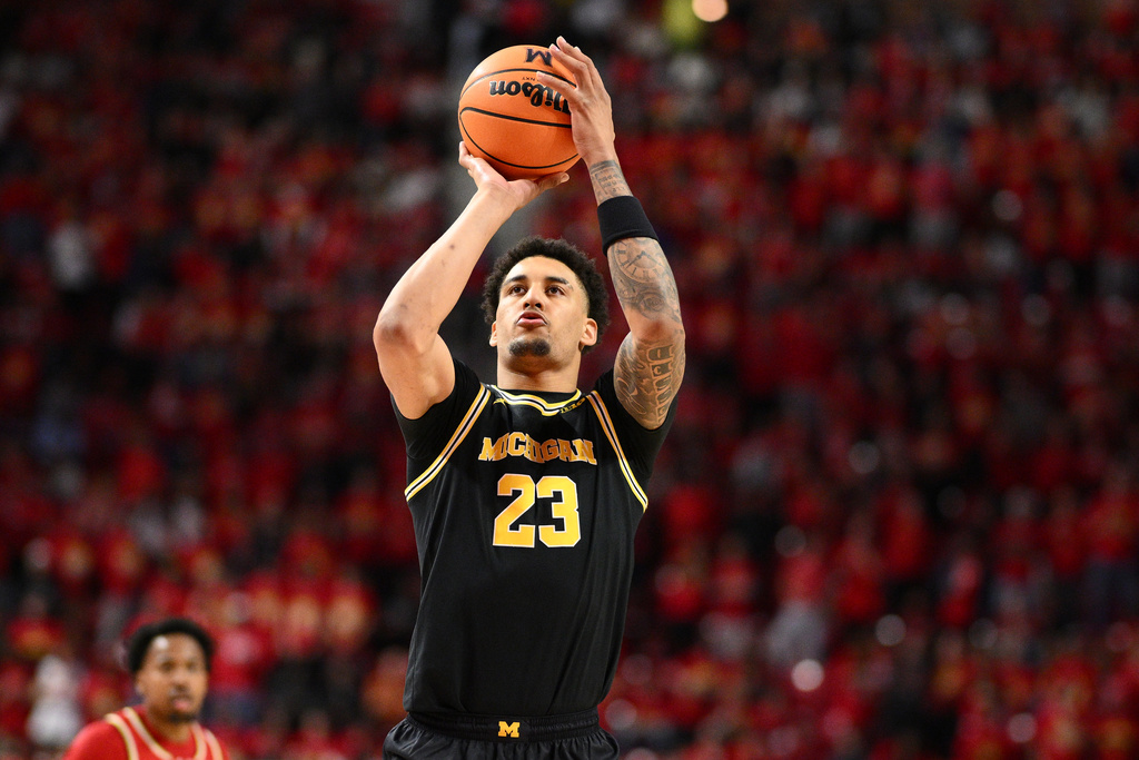 FILE - Michigan forward Yaxel Lendeborg (23) in action during the first half of an NCAA college basketball game against Maryland, Saturday, Dec. 13, 2025, in College Park, Md. (AP Photo/Nick Wass, File)