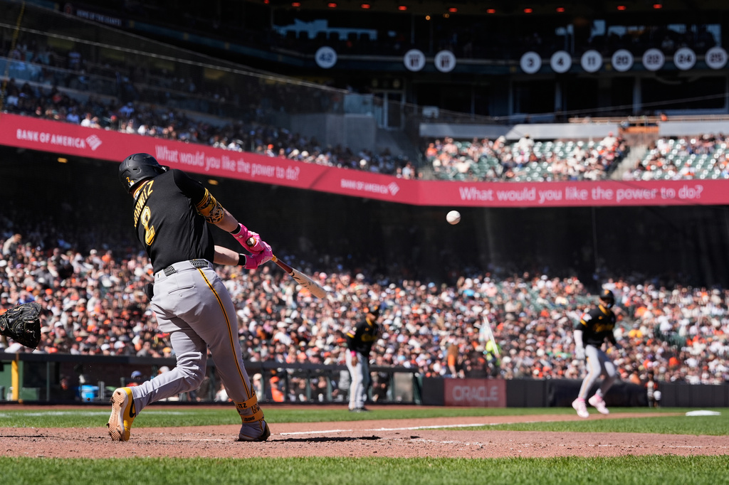 Pittsburgh Pirates' Spencer Horwitz (2) hits a two-run double during the 10th inning of a baseball game against the San Francisco Giants, Sunday, May 10, 2026, in San Francisco. (AP Photo/Godofredo A. Vásquez)