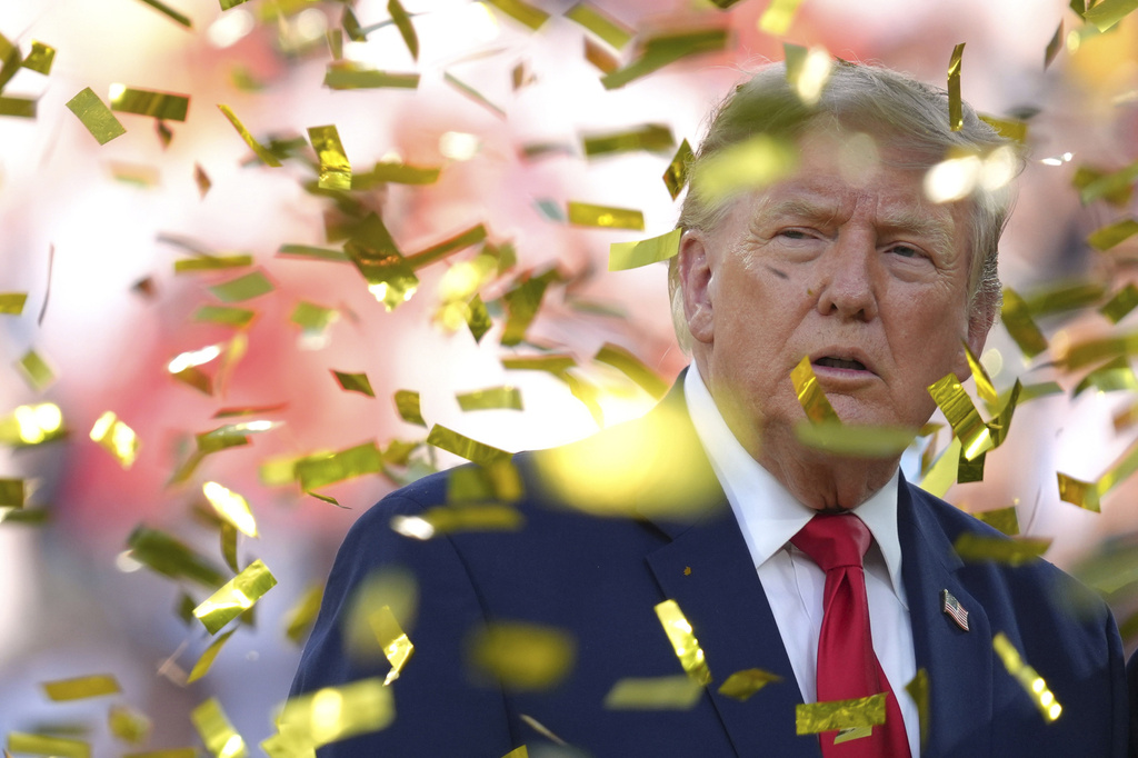 President Donald Trump is pictured as confetti falls at the conclusion of the World Cup championship final soccer match between Spain and Argentina in East Rutherford, N.J., Sunday, July 19, 2026. (AP Photo/Jacquelyn Martin)