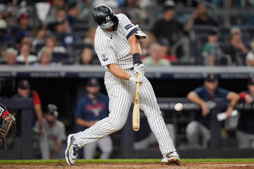 New York Yankees' Paul Goldschmidt hits a home run during the third inning of a baseball game against the Boston Red Sox, Friday, Aug. 28, 2026, in New York. (AP Photo/Yuki Iwamura)
