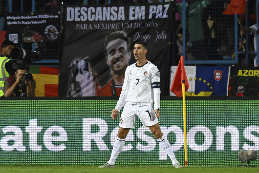 Portugal's Cristiano Ronaldo celebrates after scoring his side's second goal during a World Cup 2026 group F qualifying soccer match between Armenia and Portugal at the Vazgen Sargsyan stadium in Yerevan, Armenia, Saturday, Sept. 6, 2025. (AP Photo/Hakob Berberyan)