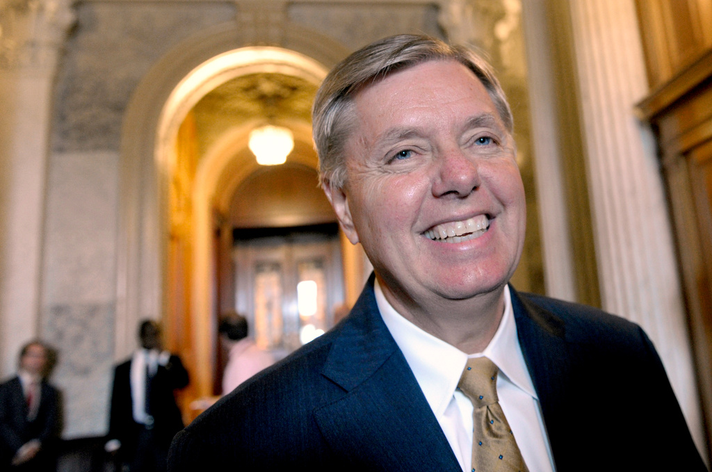 FILE - Sen. Lindsey Graham, R-S.C., speak with reporters following a vote on student loans on Capitol Hill in Washington, May 8, 2012. (AP Photo/Susan Walsh, File)
