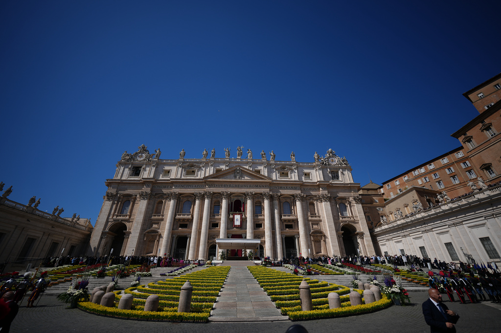 Pope Leo XIV delivers the Urbi et Orbi blessing - Latin for "to the city of Rome and to the world" - from the central loggia of St. Peter's Basilica at the end of Easter Mass he presided over in St. Peter's Square at the Vatican, Sunday, April 5, 2026. (AP Photo/Andrew Medichini)