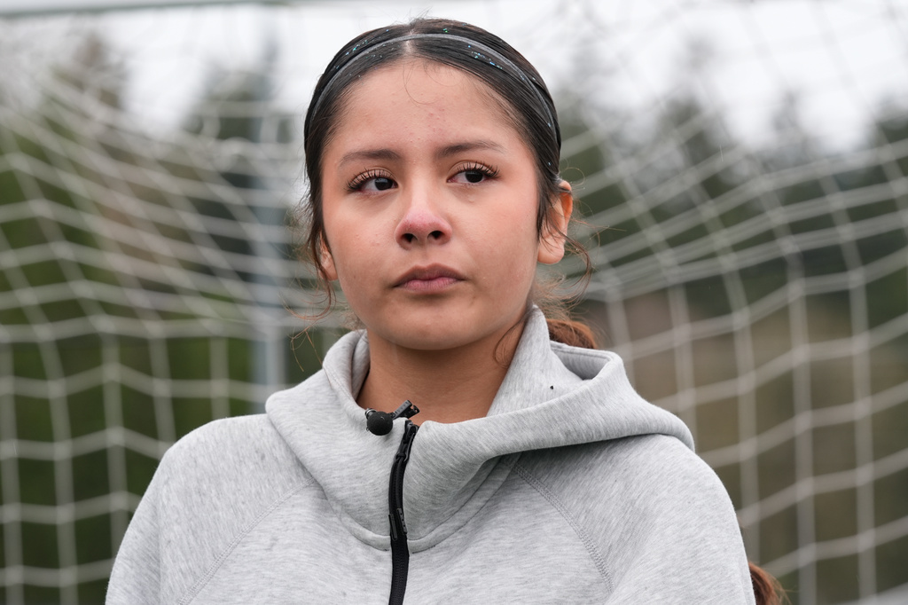 Valeria Hernandez tears up during an interview with the Associated Press at a soccer tournament for immigrant and refugee girls on Sunday, March 29, 2026, in Portland, Ore. (AP Photo/Jenny Kane)