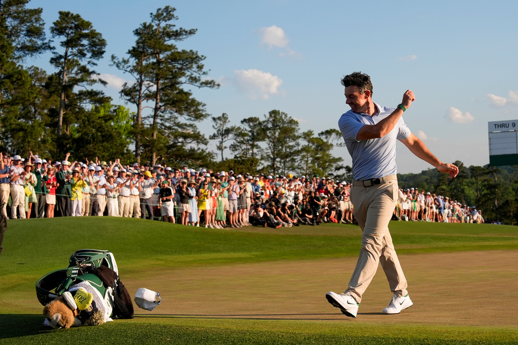 Rory McIlroy, of Northern Ireland, celebrates after winning the Masters golf tournament at the Augusta National Golf Club, Sunday, April 12, 2026, in Augusta, Ga. (AP Photo/David J. Phillip)