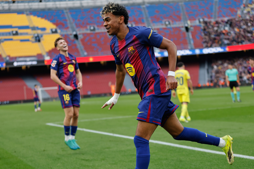 Barcelona's Lamine Yamal celebrates scoring his side's 2nd goal during the Spanish La Liga soccer match between Barcelona and Villareal in Barcelona, Spain, Saturday, Feb. 28, 2026. (AP Photo/Joan Monfort)