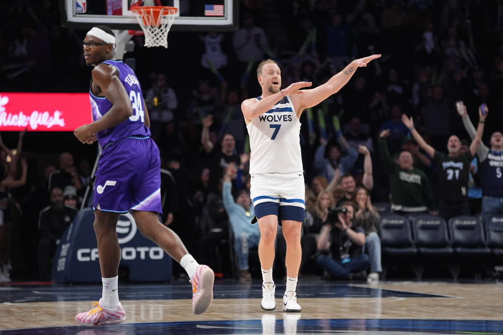 Minnesota Timberwolves forward Joe Ingles (7) celebrates after making a 3-point shot during the second half of an NBA basketball game against the Utah Jazz, Wednesday, March 18, 2026, in Minneapolis. (AP Photo/Abbie Parr)