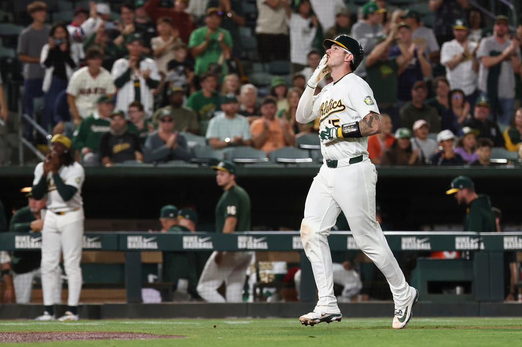 Athletics' Jonah Heim runs the bases after hitting a home run during the seventh inning of a baseball game against the Baltimore Orioles, Friday, Aug. 28, 2026, in West Sacramento, Calif. (AP Photo/Sara Nevis)