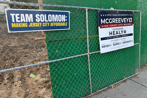 Campaign signs for Jersey City mayoral candidates are displayed in front of a vacant lot in the city's Heights neighborhood, Thursday, Oct. 23, 2025. (AP Photo/Robert Yoon) Campaign signs for Jersey City mayoral candidates are displayed in front of a vacant lot in the city's Heights neighborhood, Thursday, Oct. 23, 2025. (AP Photo/Robert Yoon)