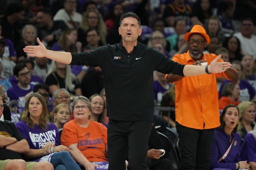 Phoenix Mercury head coach Nate Tibbetts reacts after a foul call against the Las Vegas Aces during the first half of Game 4 of the WNBA basketball finals, Friday, Oct. 10, 2025, in Phoenix. (AP Photo/Rick Scuteri) Phoenix Mercury head coach Nate Tibbetts reacts after a foul call against the Las Vegas Aces during the first half of Game 4 of the WNBA basketball finals, Friday, Oct. 10, 2025, in Phoenix. (AP Photo/Rick Scuteri)