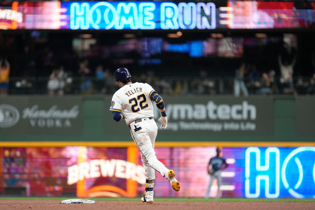 Milwaukee Brewers' Christian Yelich rounds the bases after hitting a three-run home run during the fifth inning of a baseball game against the Seattle Mariners, Tuesday, Aug. 18, 2026, in Milwaukee. (AP Photo/Aaron Gash)