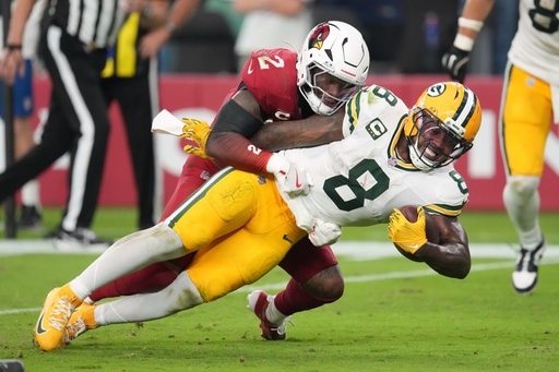Arizona Cardinals' Mack Wilson stops Green Bay Packers' Josh Jacobs during the second half of an NFL football game Sunday, Oct. 19, 2025, in Glendale, Ariz. (AP Photo/Ross D. Franklin) Arizona Cardinals' Mack Wilson stops Green Bay Packers' Josh Jacobs during the second half of an NFL football game Sunday, Oct. 19, 2025, in Glendale, Ariz. (AP Photo/Ross D. Franklin)
