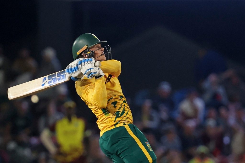 South Africa's batsman Ryan Rickelton watches his shot during the T20 International cricket match between South Africa and West Indies, in Paarl, South Africa, Tuesday, Jan. 27, 2026. (AP Photo/Halden Krog)
