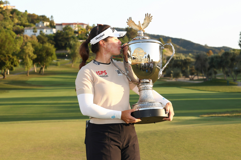 Hannah Green poses with the trophy after winning the LPGA JM Eagle LA Championship golf tournament at El Caballero Country Club Sunday, April 19, 2026, in Los Angeles. (AP Photo/Jessie Alcheh)