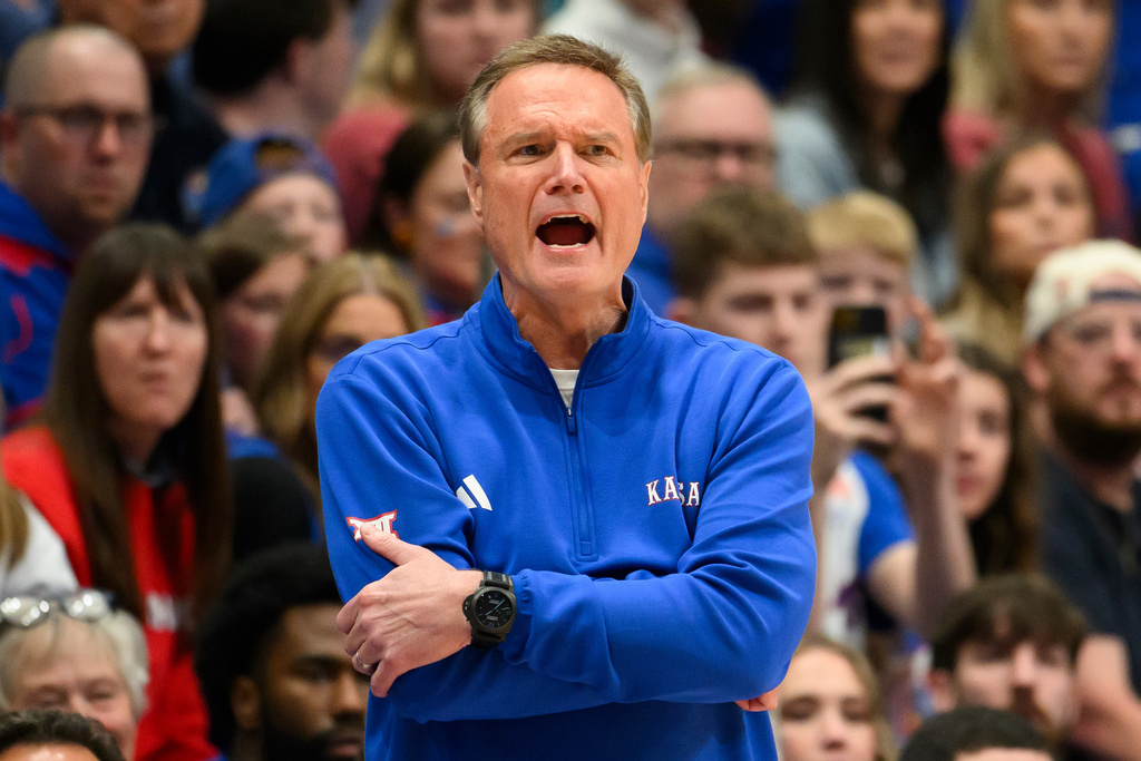 Kansas head coach Bill Self shouts directions to his team during the first half of an NCAA college basketball game against Kansas State in Lawrence, Kan., Saturday, March 7, 2026. (AP Photo/Reed Hoffmann)