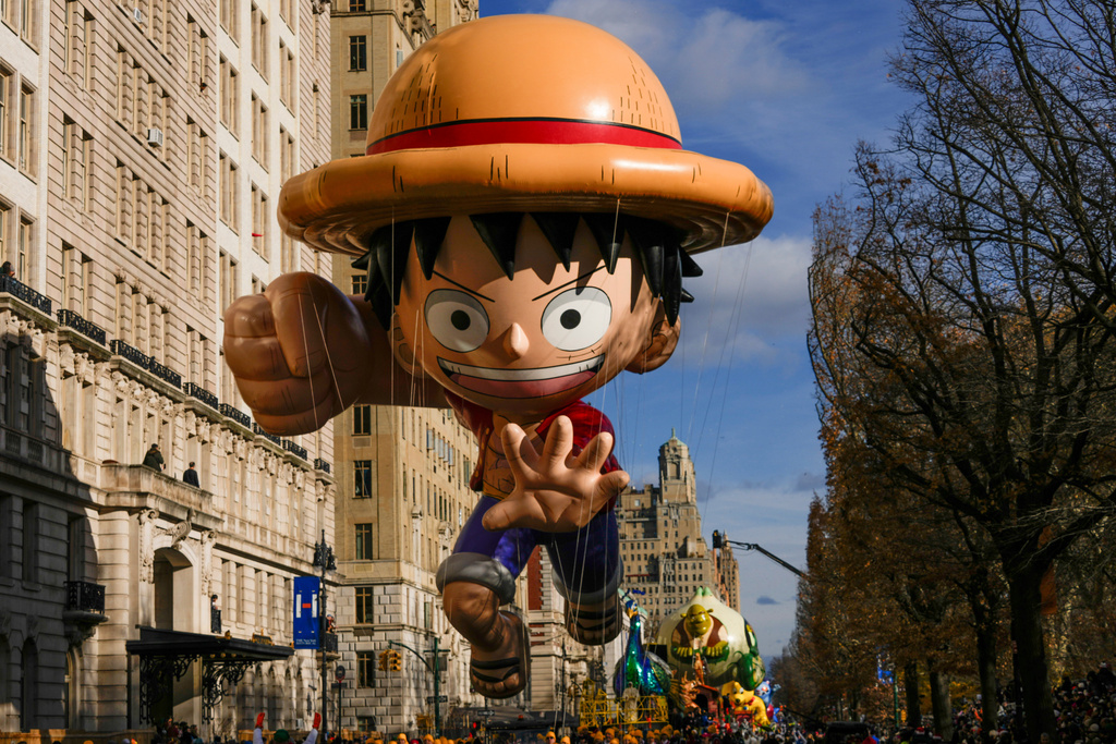 The Monkey D. Luffy balloon floats down Central Park West during the Macy's Thanksgiving Day Parade, Thursday, Nov. 27, 2025, in New York. (AP Photo/Frank Franklin)
