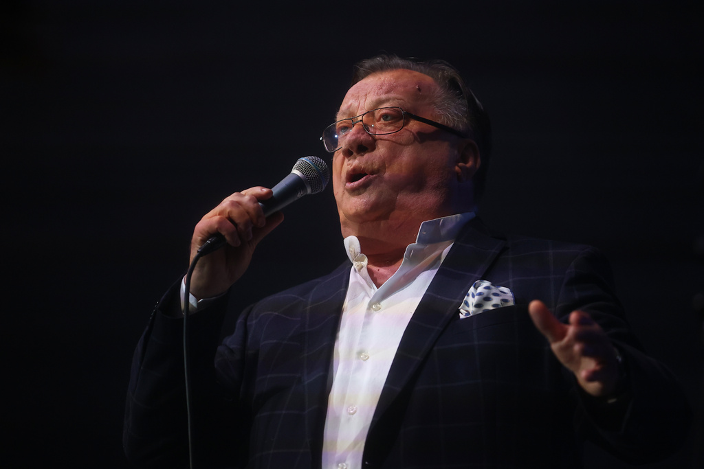 FILE - A popular Bosnian folk singer Halid Beslic who also was also widely known for his humanitarian work during and after the country's bloody 1992-95 war performs during a concert, in Sarajevo, Bosnia, Nov. 11, 2023. (AP Photo/Armin Durgut, File)