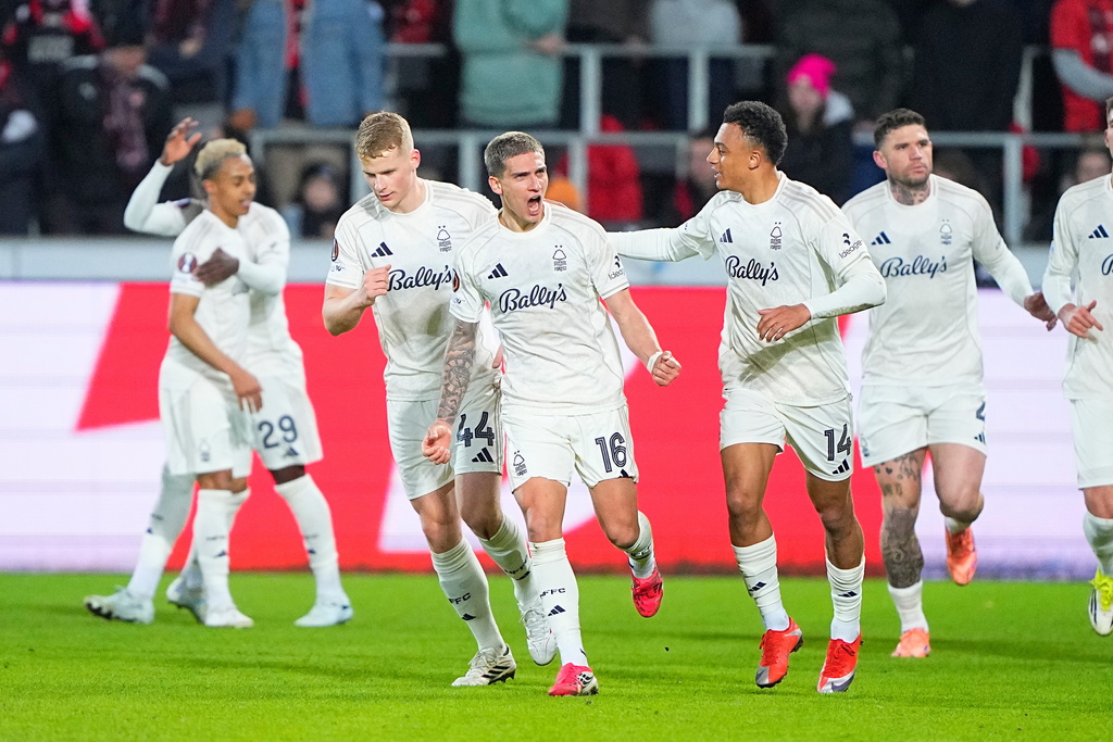 Nottingham Forest's Nicolas Dominguez celebrates scoring with teammates during the Europa League soccer match between FC Midtjylland and Nottingham Forest in Herning, Denmark, Thursday March 19, 2026. (Bo Amstrup/Ritzau Scanpix via AP)